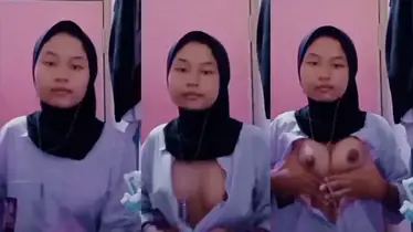 Bokep VCS Hijab Bocil Sange Remas Payudara poster